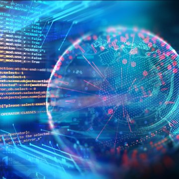 Digital globe beside tech coding